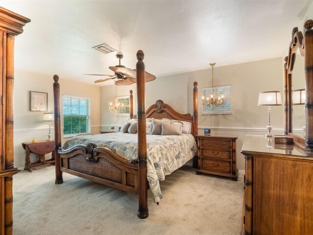 5556 Round Lake Rd, Apopka, FL 32712 - bedroom with a chandelier and light carpet