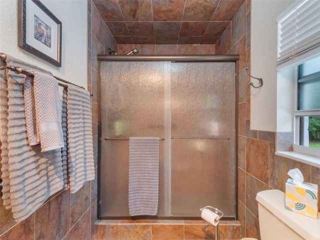 5556 Round Lake Rd, Apopka, FL 32712 - full bathroom with a shower stall and tile walls