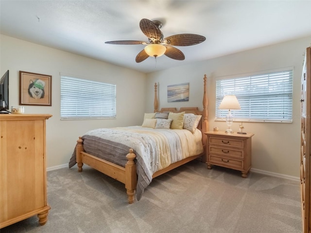 5556 Round Lake Rd, Apopka, FL 32712 - bedroom with light colored carpet and ceiling fan