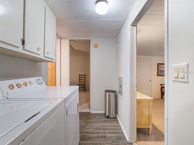 5556 Round Lake Rd, Apopka, FL 32712 - laundry room with cabinet space, washing machine and dryer, and dark wood-type flooring
