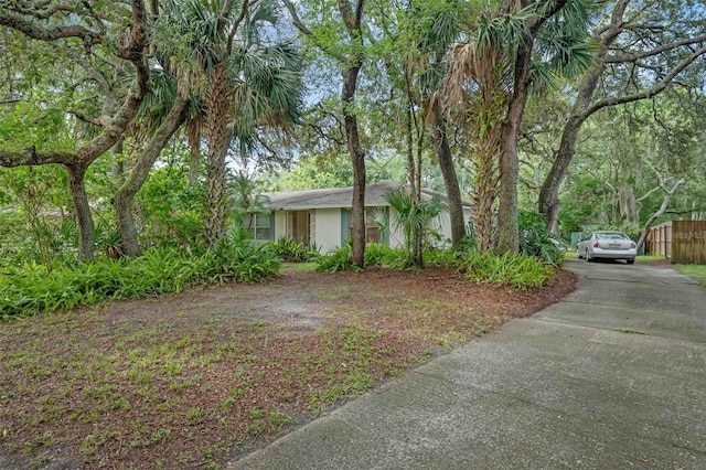 806 Leopard Trl, Winter Springs, FL 32708 - view of front of property with driveway and stucco siding