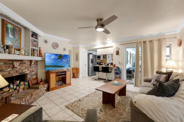 806 Leopard Trl, Winter Springs, FL 32708 - living room featuring crown molding, light tile patterned floors, a ceiling fan, and a brick fireplace