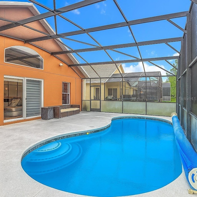 167 Castaway Beach Way, Kissimmee, FL 34746 - swimming pool with a patio area and a lanai