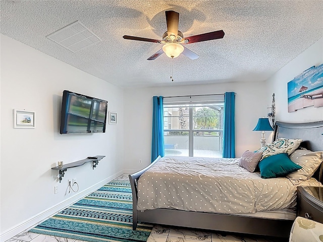 167 Castaway Beach Way, Kissimmee, FL 34746 - bedroom featuring a textured ceiling and ceiling fan