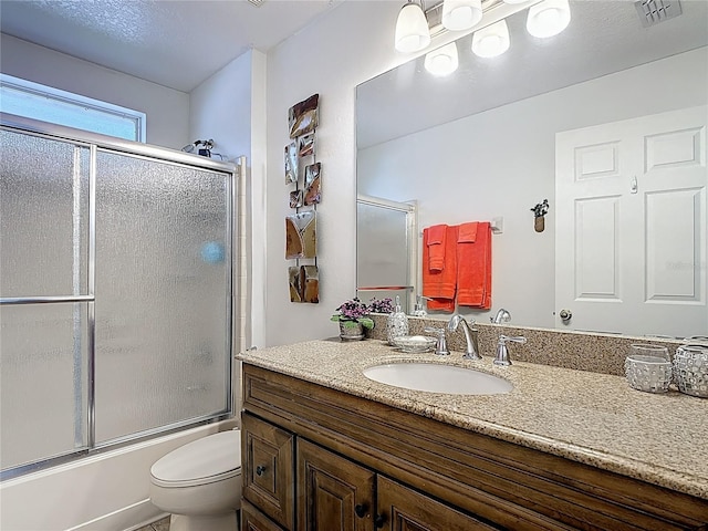 167 Castaway Beach Way, Kissimmee, FL 34746 - bathroom featuring vanity and enclosed tub / shower combo