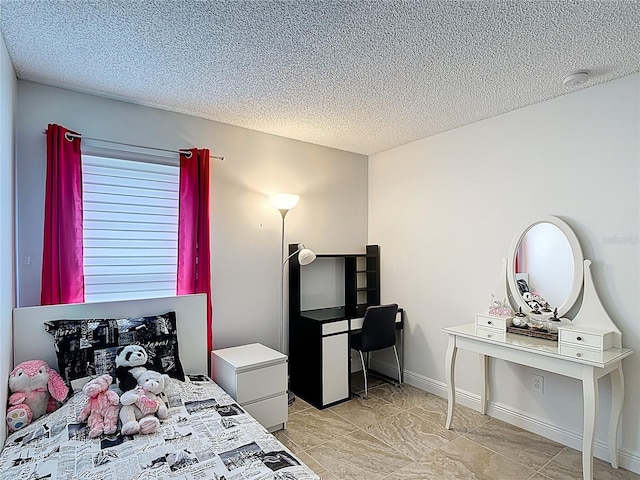 167 Castaway Beach Way, Kissimmee, FL 34746 - bedroom with a textured ceiling and a desk