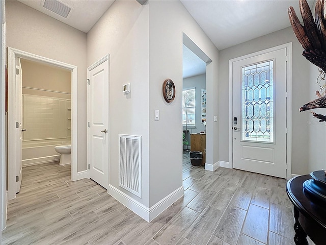 655 Conservation Blvd, Groveland, FL 34736 - entryway featuring light wood finished floors