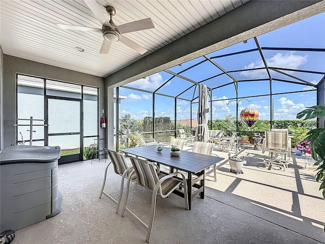 655 Conservation Blvd, Groveland, FL 34736 - view of patio / terrace with outdoor dining space, a lanai, and a ceiling fan