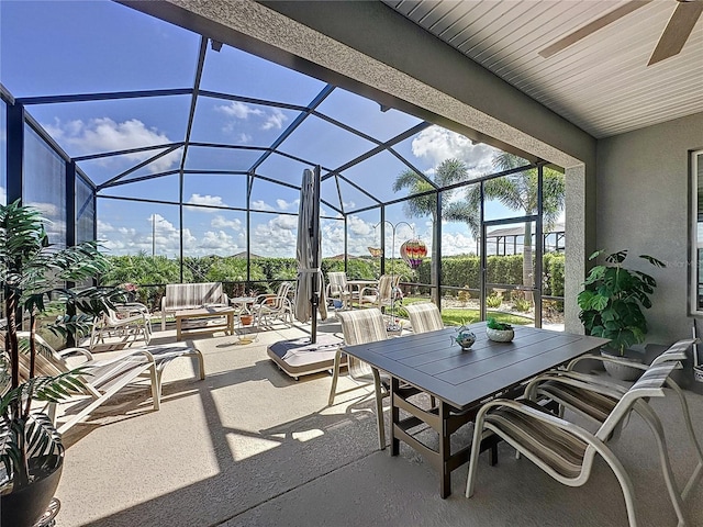 655 Conservation Blvd, Groveland, FL 34736 - view of patio / terrace featuring outdoor dining space and a lanai