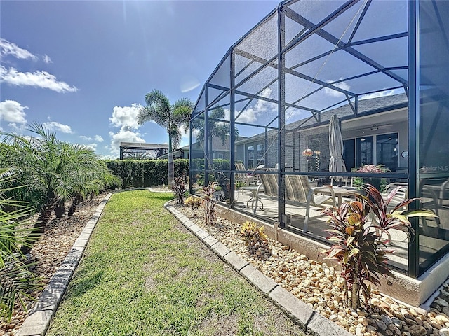 655 Conservation Blvd, Groveland, FL 34736 - view of yard featuring a patio and a lanai