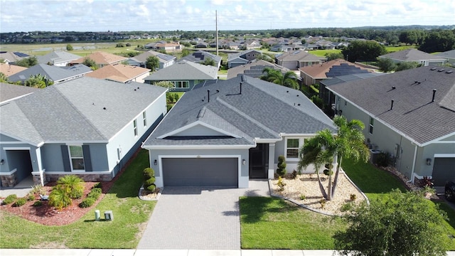 655 Conservation Blvd, Groveland, FL 34736 - aerial perspective of suburban area