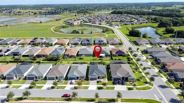 655 Conservation Blvd, Groveland, FL 34736 - aerial overview of property's location with nearby suburban area and a large body of water