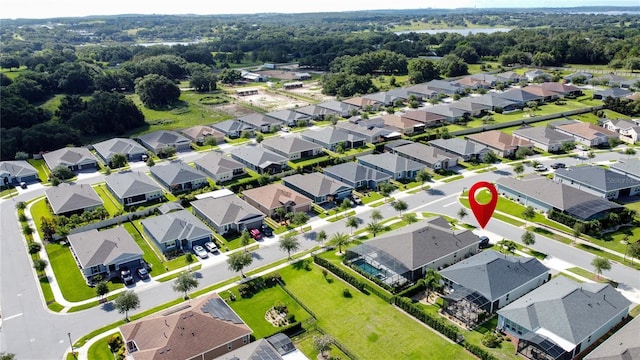 655 Conservation Blvd, Groveland, FL 34736 - aerial overview of property's location with nearby suburban area