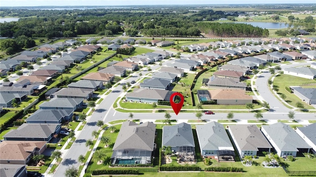 655 Conservation Blvd, Groveland, FL 34736 - aerial overview of property's location featuring nearby suburban area and a nearby body of water