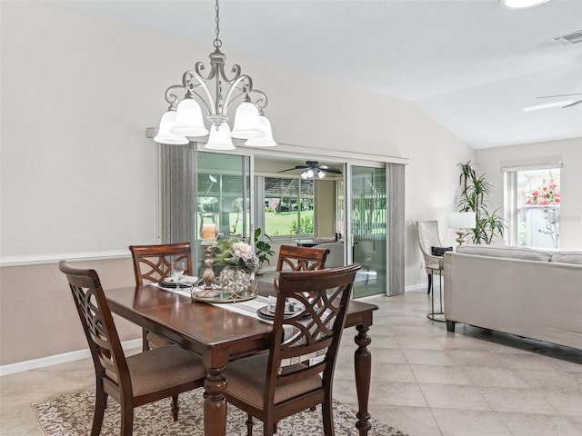 487 Thistledown Way, The Villages, FL 32162 - dining space featuring a ceiling fan, a chandelier, vaulted ceiling, and light tile patterned flooring