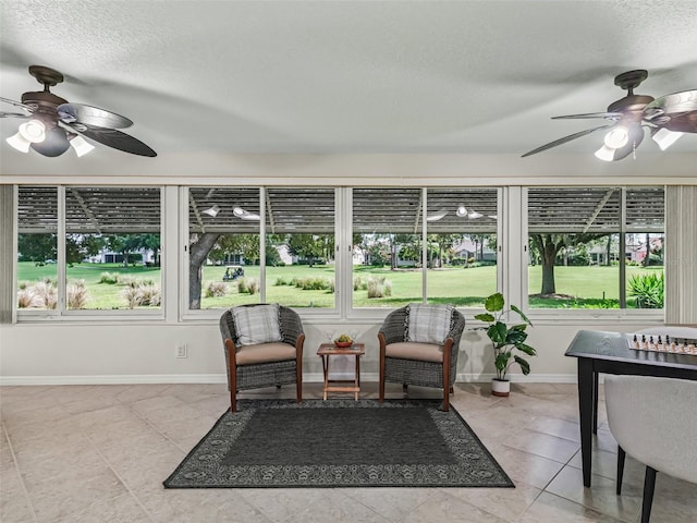 487 Thistledown Way, The Villages, FL 32162 - sunroom featuring a ceiling fan
