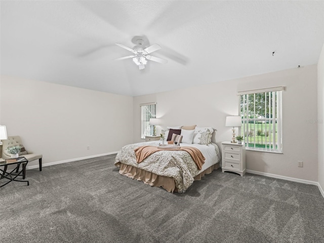 487 Thistledown Way, The Villages, FL 32162 - bedroom featuring carpet flooring, multiple windows, vaulted ceiling, and a ceiling fan