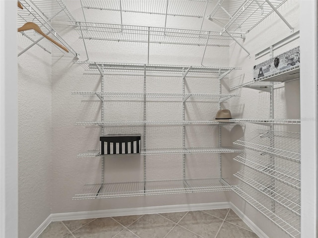 487 Thistledown Way, The Villages, FL 32162 - spacious closet with tile patterned floors