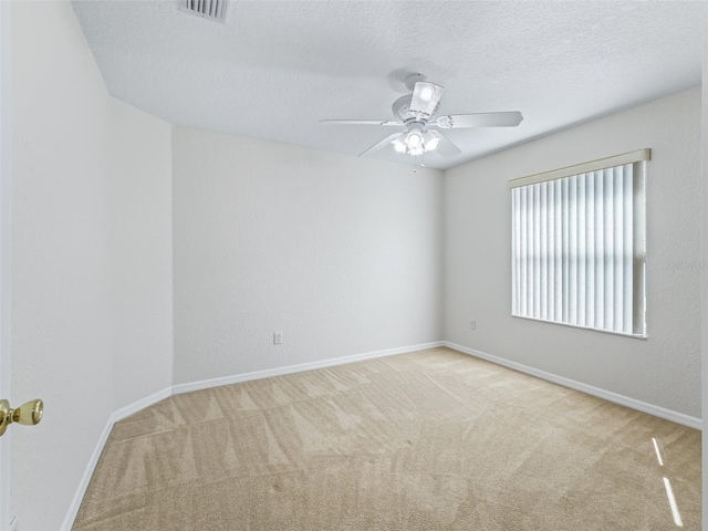 487 Thistledown Way, The Villages, FL 32162 - carpeted empty room with ceiling fan and a textured ceiling