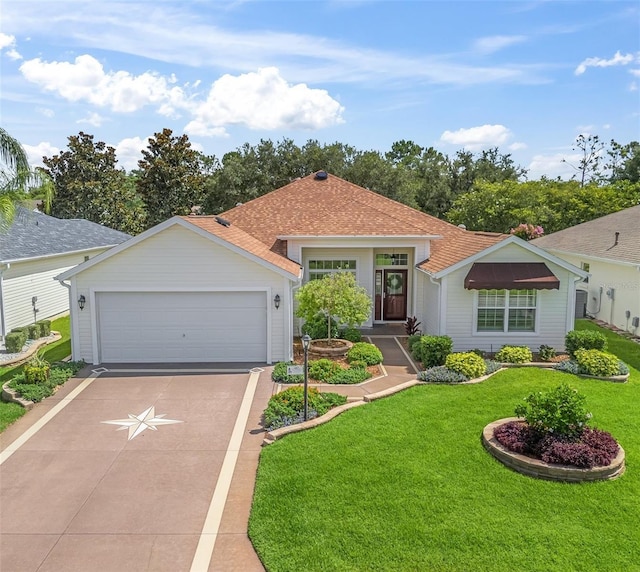 487 Thistledown Way, The Villages, FL 32162 - ranch-style home featuring driveway, a front yard, an attached garage, and a shingled roof