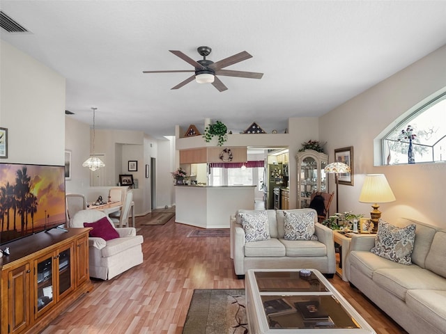 4814 Saint Andrews Arc, Leesburg, FL 34748 - living room with wood finished floors and a ceiling fan