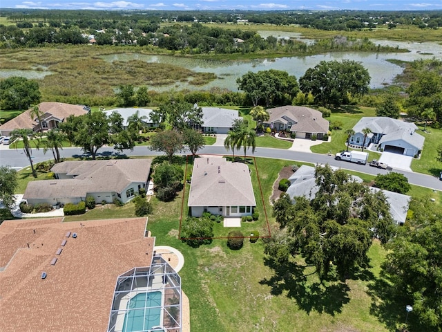 4814 Saint Andrews Arc, Leesburg, FL 34748 - aerial view of property's location with a nearby body of water and nearby suburban area