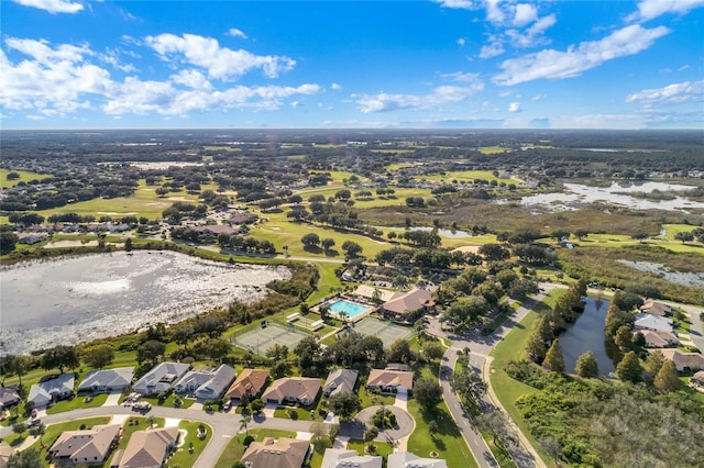 4814 Saint Andrews Arc, Leesburg, FL 34748 - aerial view of property and surrounding area featuring a nearby body of water and nearby suburban area