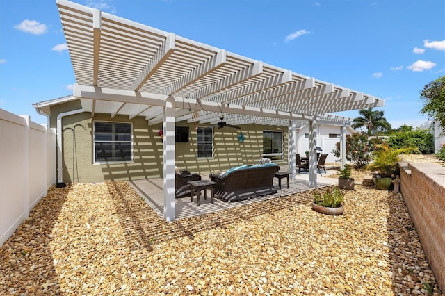 2465 Violet Ct, The Villages, FL 32162 - fenced backyard with outdoor lounge area, a pergola, a ceiling fan, and a patio