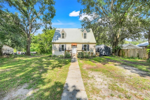 323 Savage Way, Groveland, FL 34736 - view of front of home featuring a metal roof