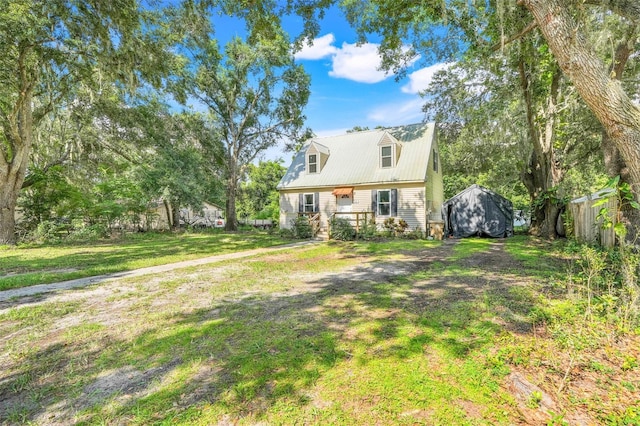 323 Savage Way, Groveland, FL 34736 - view of front of property featuring a metal roof