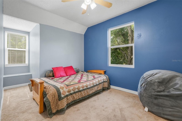 323 Savage Way, Groveland, FL 34736 - carpeted bedroom featuring lofted ceiling and a ceiling fan
