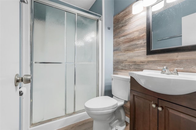 323 Savage Way, Groveland, FL 34736 - full bathroom with wood walls, vanity, a stall shower, and wood finished floors