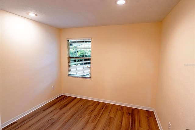 681 Greywood Dr, Altamonte Springs, FL 32701 - spare room with wood finished floors and recessed lighting