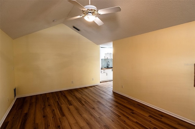681 Greywood Dr, Altamonte Springs, FL 32701 - unfurnished room featuring ceiling fan, dark wood finished floors, and vaulted ceiling