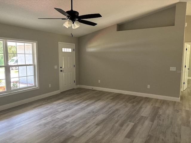 1176 W Bridge Dr, Citrus Springs, FL 34434 - entryway with wood finished floors, ceiling fan, and a textured ceiling