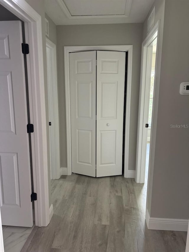 1176 W Bridge Dr, Citrus Springs, FL 34434 - hall with baseboards and wood finished floors