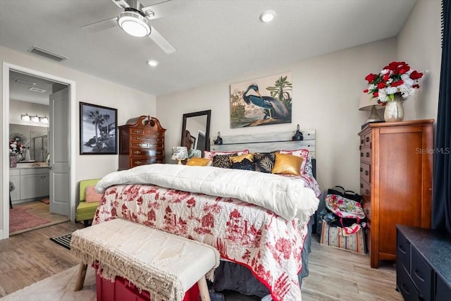 1055 Rustic Mill Dr, Saint Augustine, FL 32092 - bedroom with light wood finished floors, ensuite bathroom, ceiling fan, and recessed lighting