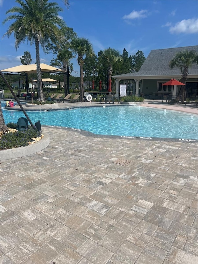1055 Rustic Mill Dr, Saint Augustine, FL 32092 - community pool with a patio area and a gazebo