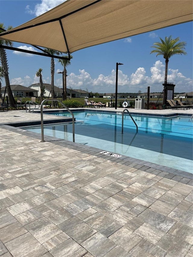 1055 Rustic Mill Dr, Saint Augustine, FL 32092 - community pool with a patio area