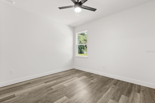 321 Watershore Dr, Leesburg, FL 34748 - unfurnished room with wood finished floors and ceiling fan