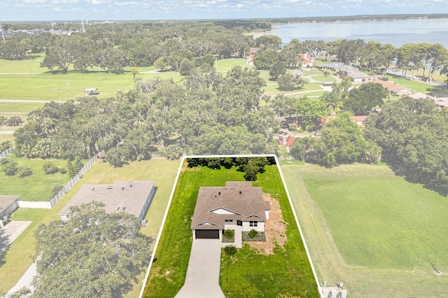 321 Watershore Dr, Leesburg, FL 34748 - aerial view of property's location featuring a large body of water and property parcel outlined