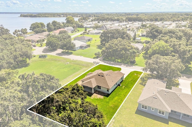 321 Watershore Dr, Leesburg, FL 34748 - aerial view of residential area featuring a large body of water and property parcel outlined
