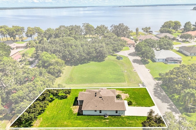 321 Watershore Dr, Leesburg, FL 34748 - aerial view of residential area with a large body of water and property parcel outlined