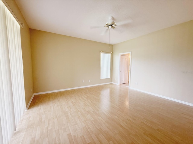 3416 Capland Ave, Clermont, FL 34711 - spare room featuring light wood-style flooring and a ceiling fan