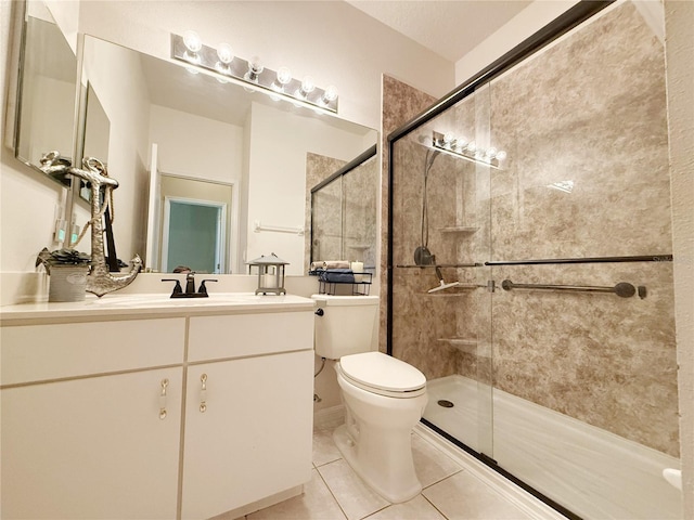 3416 Capland Ave, Clermont, FL 34711 - full bath with a shower stall, vanity, and tile patterned flooring