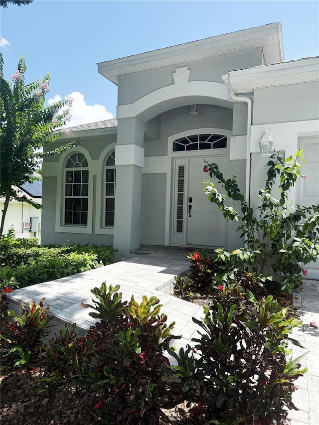 3416 Capland Ave, Clermont, FL 34711 - property entrance with stucco siding