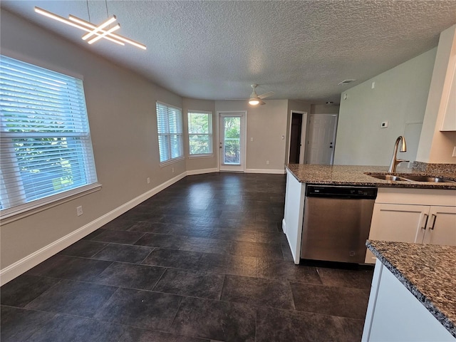 711 Sugar Bay Way Unit 115, Lake Mary, FL 32746 - kitchen with dishwasher, open floor plan, white cabinets, a textured ceiling, and ceiling fan