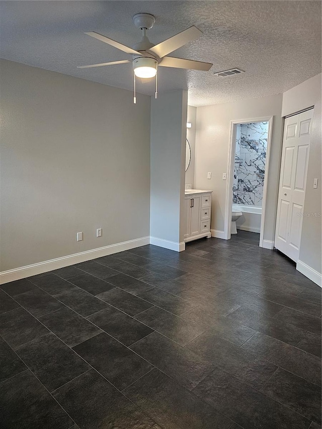 711 Sugar Bay Way Unit 115, Lake Mary, FL 32746 - unfurnished room with a ceiling fan and a textured ceiling
