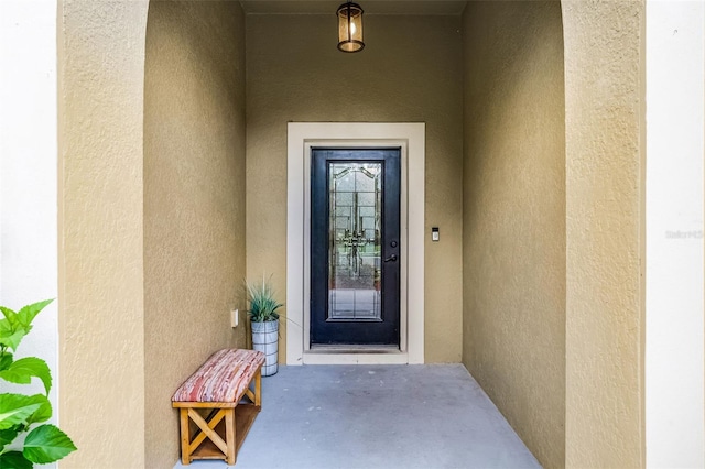 418 Rock Springs Cir, Groveland, FL 34736 - view of exterior entry with stucco siding