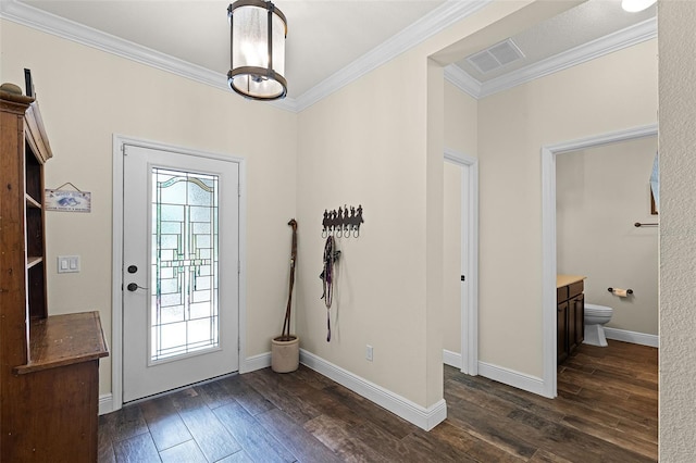 418 Rock Springs Cir, Groveland, FL 34736 - foyer entrance with ornamental molding and dark wood-style flooring